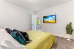 Master bedroom features a 40-inch Roku TV enabled w/ Sling streaming service